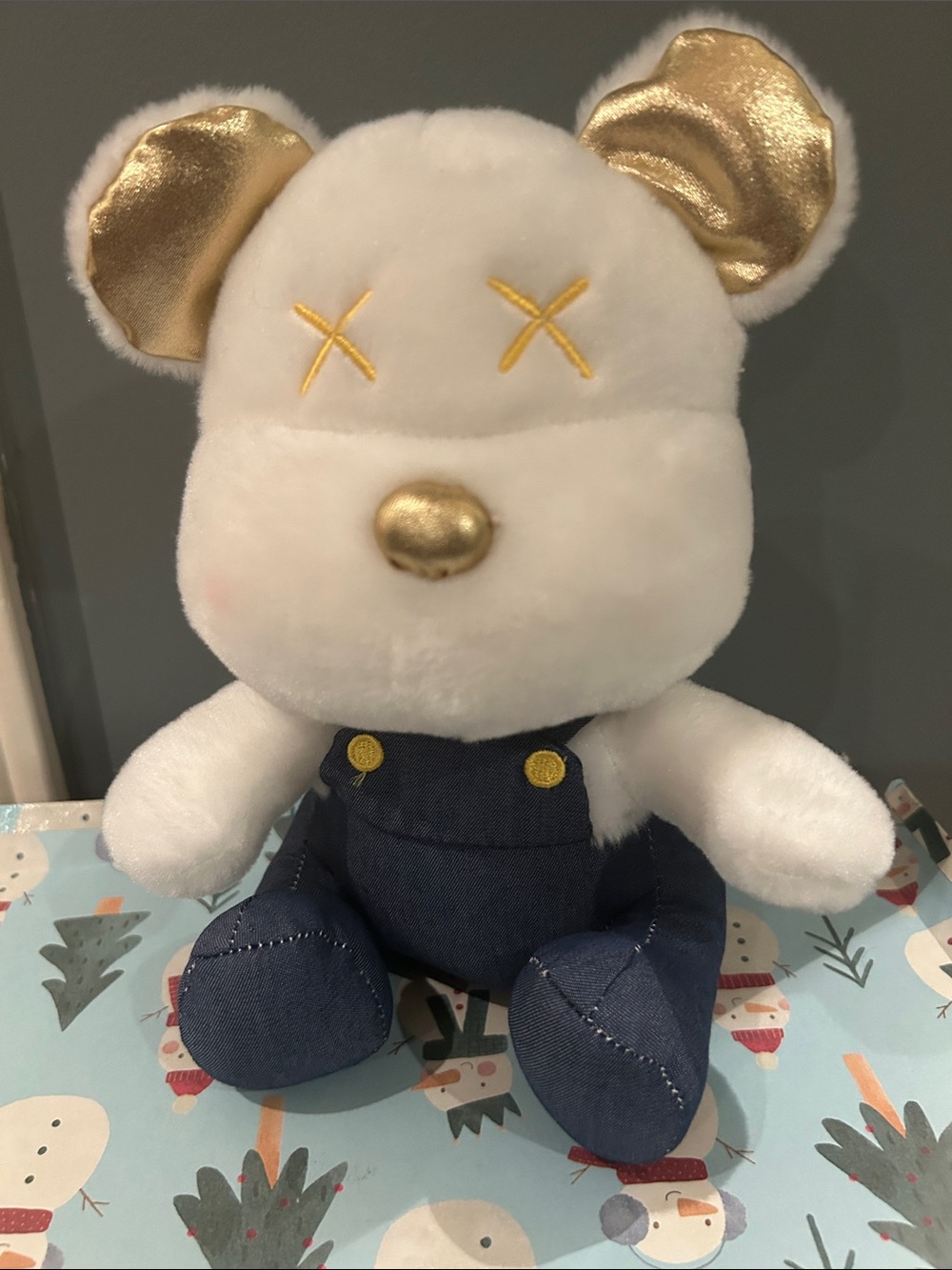 KAWS-style companion bear with signature "X" eyes and gold ears 10”